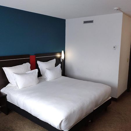 Готель Golden Tulip Roissy Saint Witz Екстер'єр фото