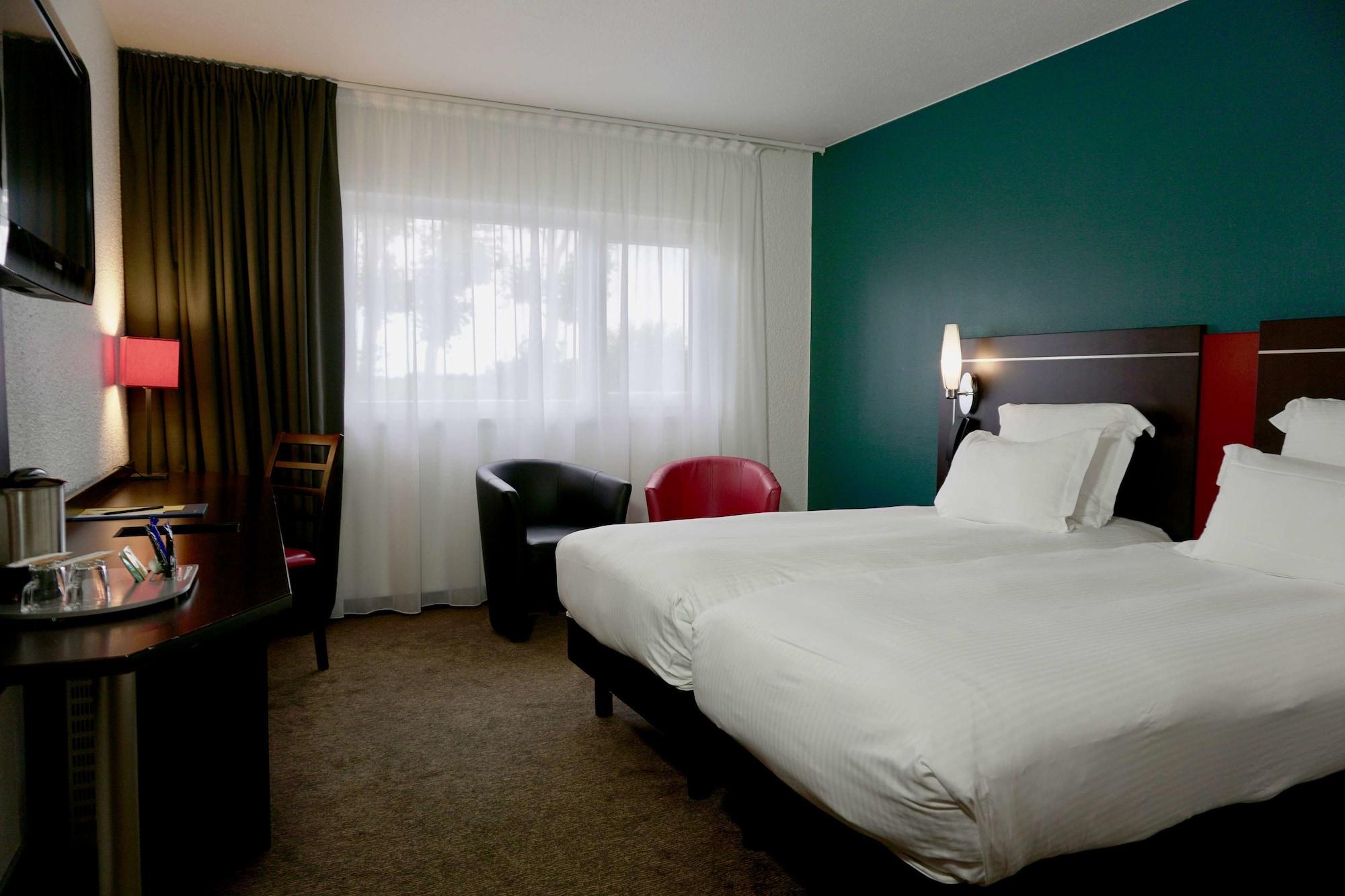 Готель Golden Tulip Roissy Saint Witz Екстер'єр фото
