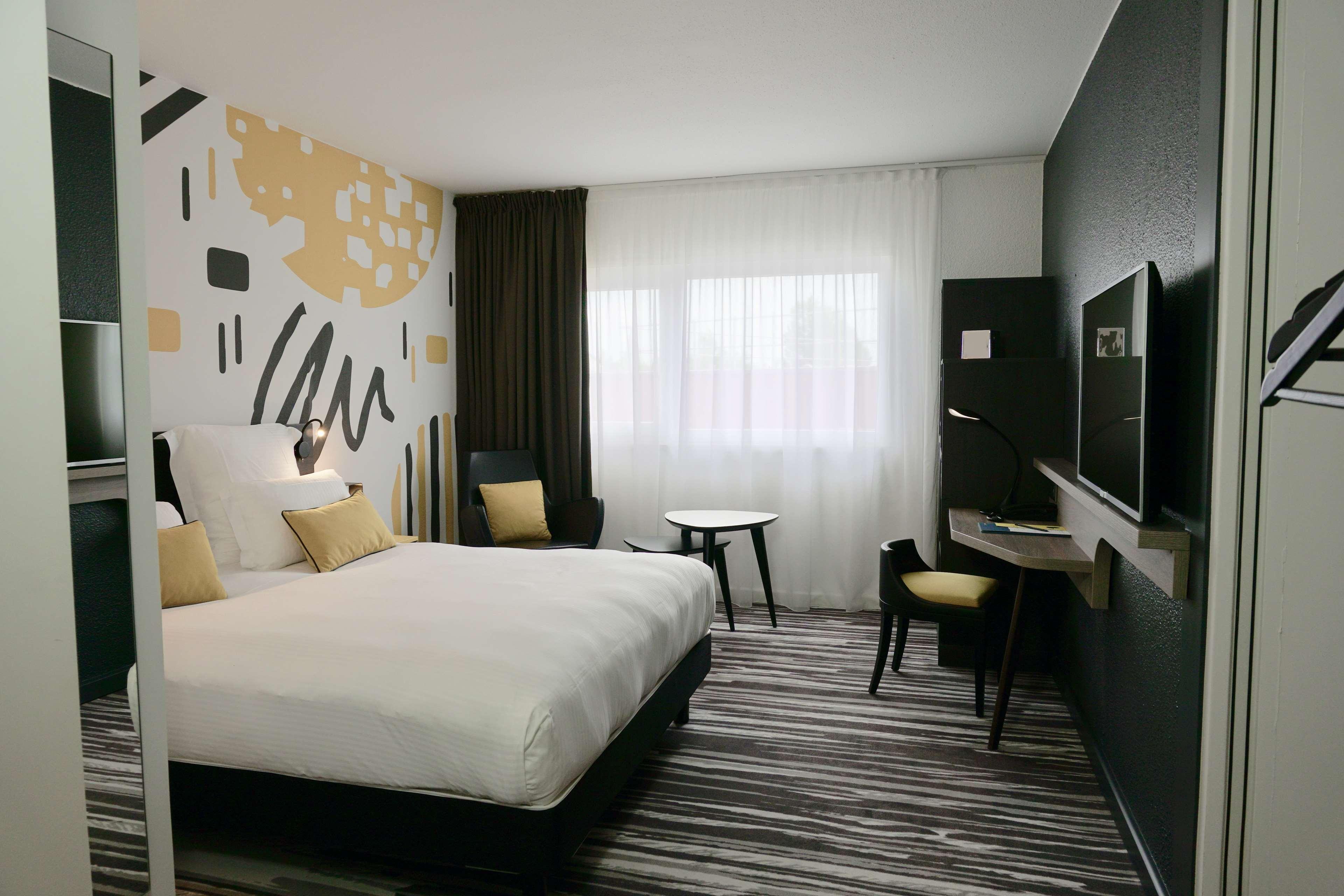 Готель Golden Tulip Roissy Saint Witz Екстер'єр фото